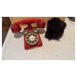Vintage red toy, phone, and a real fur Persian