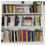 Collection of about 100 cookbooks, three shelves,