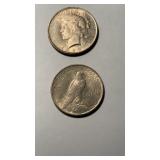 2 US Peace silver dollars , both 1923