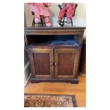 Two door cabinet, with a slide out shelf, top