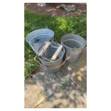 3 galvanized buckets, one with a washer, ringer