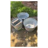 3 galvanized buckets, one with a washer, ringer,