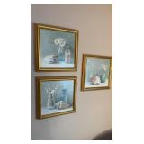 Three gold framed still life prints all with a