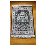 Very small, oriental carpet rug, with hand, tied