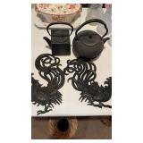 2 cast Iron teapots, round one made in Japan with