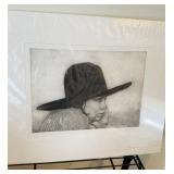 Matted engraving of a young girl with a large hat