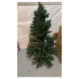 Two section artificial Christmas tree measures