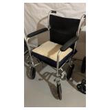 Collapsible wheelchair, with the foot rest, clamp
