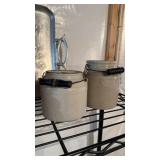 2 small antique stoneware jugs with lids, and