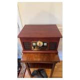 Old style radio, record player turntable,