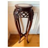 Antique carved wood stand, with a pink vein marble