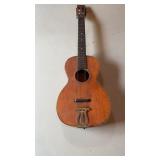 Antique 1930s acoustic guitar by the Tonk