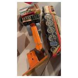 Antique metal diesel tractor steamroller with a