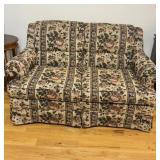 Small two person sofa with rose pattern,