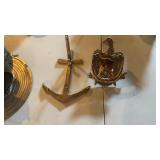 Brass anchor wall hook and a brass American bald