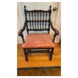 Antique carved oak armchair, with a spindle back,