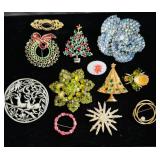Group lot, a vintage brooches, includes two