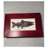 Painted tile salmon fish in the Alaskan Inuit