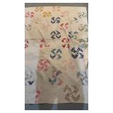 Full-size antique quilt, with different colored
