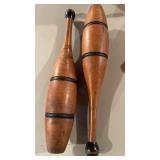 Pair of antique wooden Indian clubs, marked one