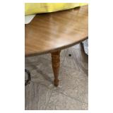 Oval kitchen table with three matching chairs and