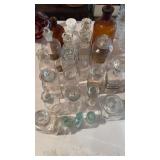 Group of Antique medicine bottles, most with the