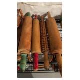4 antique wood, rolling pins, one larger one with