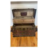 Antique storage steamer trunk, with a green