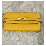 Hermï¿½s Kelly Longue leather hand bag or wallet