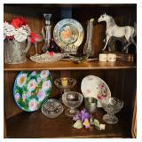 Contents of the two shelves in the corner