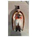 Jockey horseshoe liquor to canter, marked at the