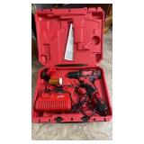Milwaukee battery operated drill, with extra