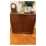 Two door, wood cabinet, with two shelves behind,