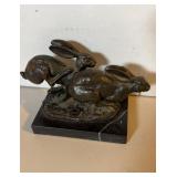 Vintage rabbit hare bronze sculpture on a marble