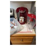 Red Keurig coffee maker & Britta water jug