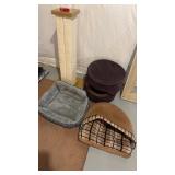 Three cat beds, and one scratching post and a red