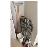 Two aluminum walkers, small basket with some