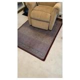 Burgundy carpet with a clear hard plastic