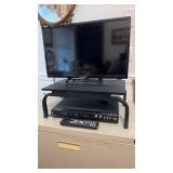 Office 24 inch flatscreen TV with a 8 inch tall