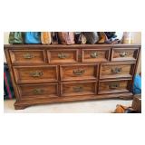 Nine drawer, long dresser with a matching mirror