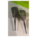 2 matching sterling silver backed hairbrushes,