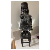 Vintage bronze figurine of a young girl standing