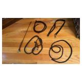 Five leather items, including one writing crop,