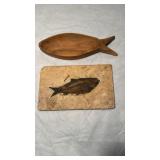 Large fossilized, fish, and a stone, and a carved