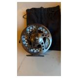 Brytec fly fishing reel, with a light blue string