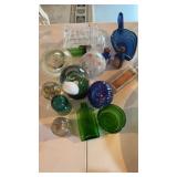 Vintage blue and green glass items, including a