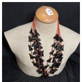 Vintage Coral & Jet-Black Carved Wolves Necklace