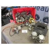 Assorted small engine carburetors and accessories