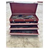 Red tool box including contents, sockets,
