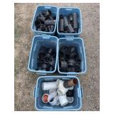 Various Black Plumbing Pipe In 5 Blue Bins
